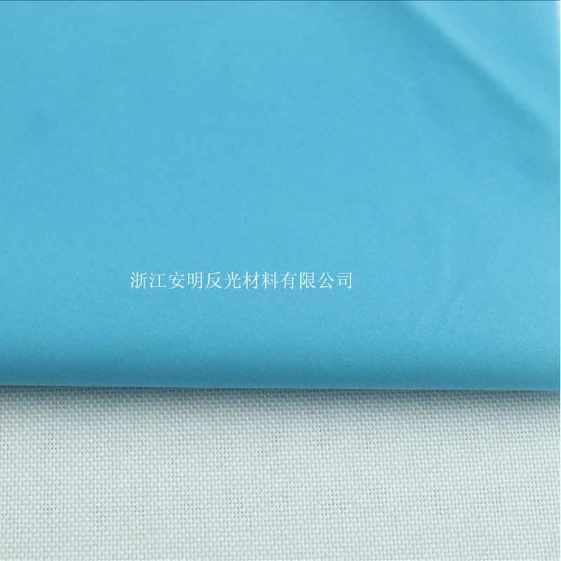 380超柔蓝色烫金尼丝纺 警示服面料 夜光骑行服面料