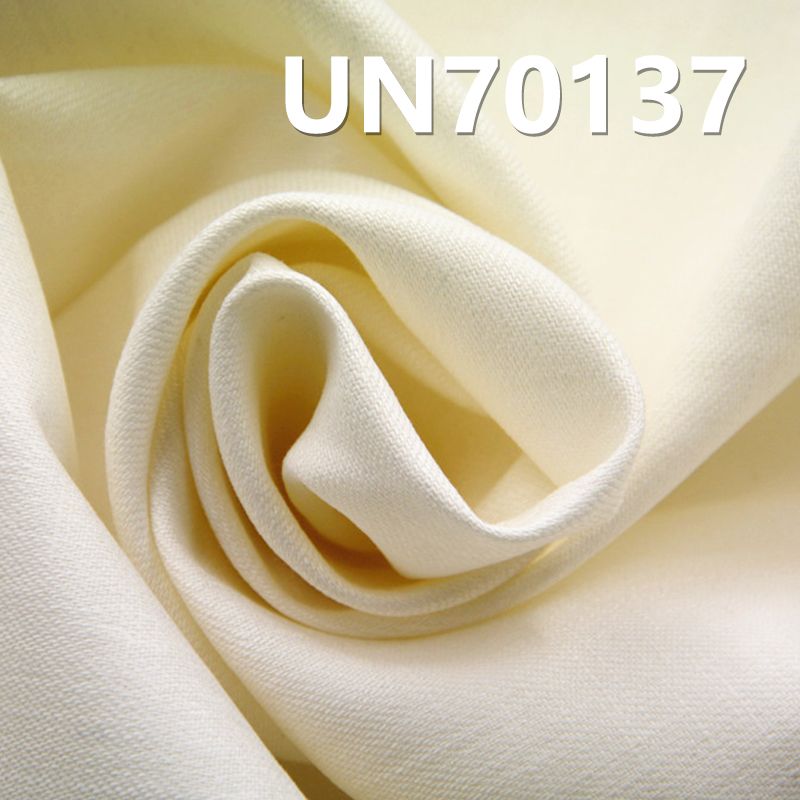 【半漂】棉彈横直竹節三片右斜染色布 262g/m2 52/53” UN70137