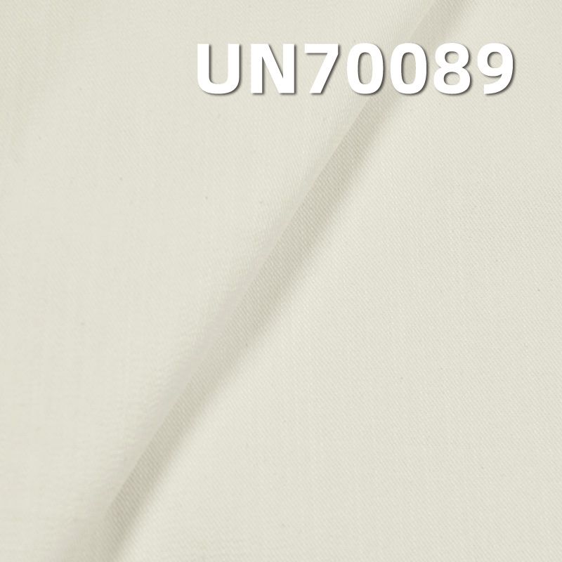 【半漂】	棉弹直竹节三片"S"斜纹 55/56"290g/m2 UN70089